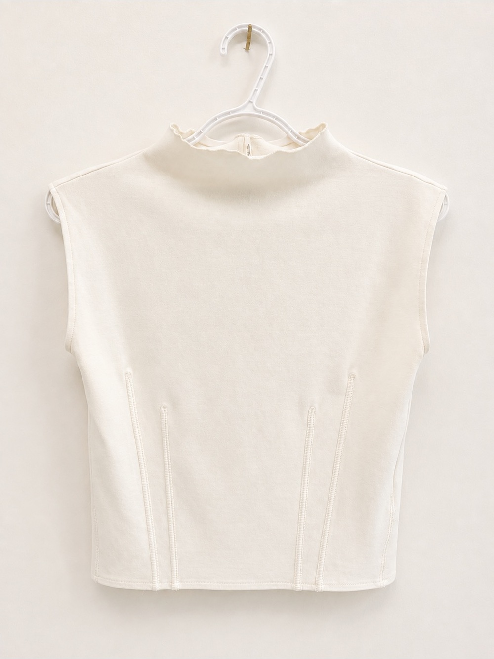 Anthropologie Sleeveless Mock Neck Top in Cream